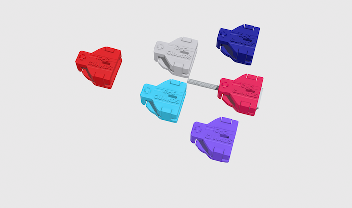 Six CPC Guards™ MagDogs 2x model. Different colors: Hot pink, Cherry red, Dark blue, Aquamarine, purple, Pearl gray. Arrange on three rows. First row has three models. Second row had two models. Third row has one model. The Hot pink model in first row has a iPhone MagSafe 3 magnetic T-shape charging cable attached.