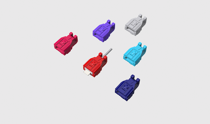 Five CPC Guards™ T-Dogs model. Different colors: Hot pink, Cherry red, Dark blue, Aquamarine, purple, Pearl gray. Arrange on three rows. First row has three models. Second row had two models. Third row has one model. The red model in first row has a USB type -C model attached.